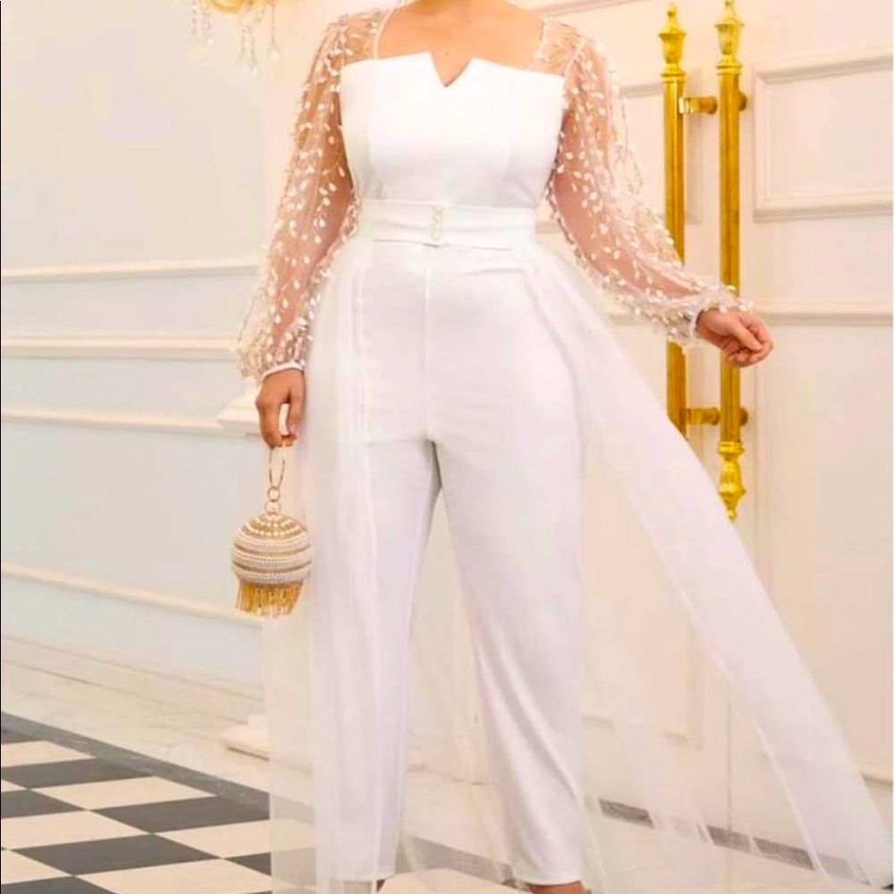 White jumpsuit with tulle skirt